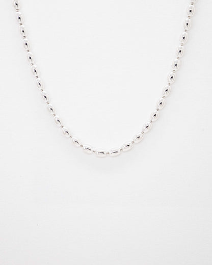 Oval ball silver Necklace with gold beans