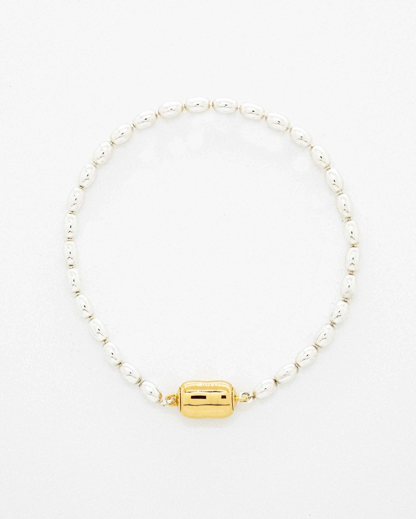 Oval ball silver Bracelet with gold beans